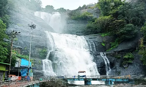 Tenkasi waterfall landmark image representing car loan services in Tenkasi district for new car finance, used car loans, and flexible EMI repayment plans.