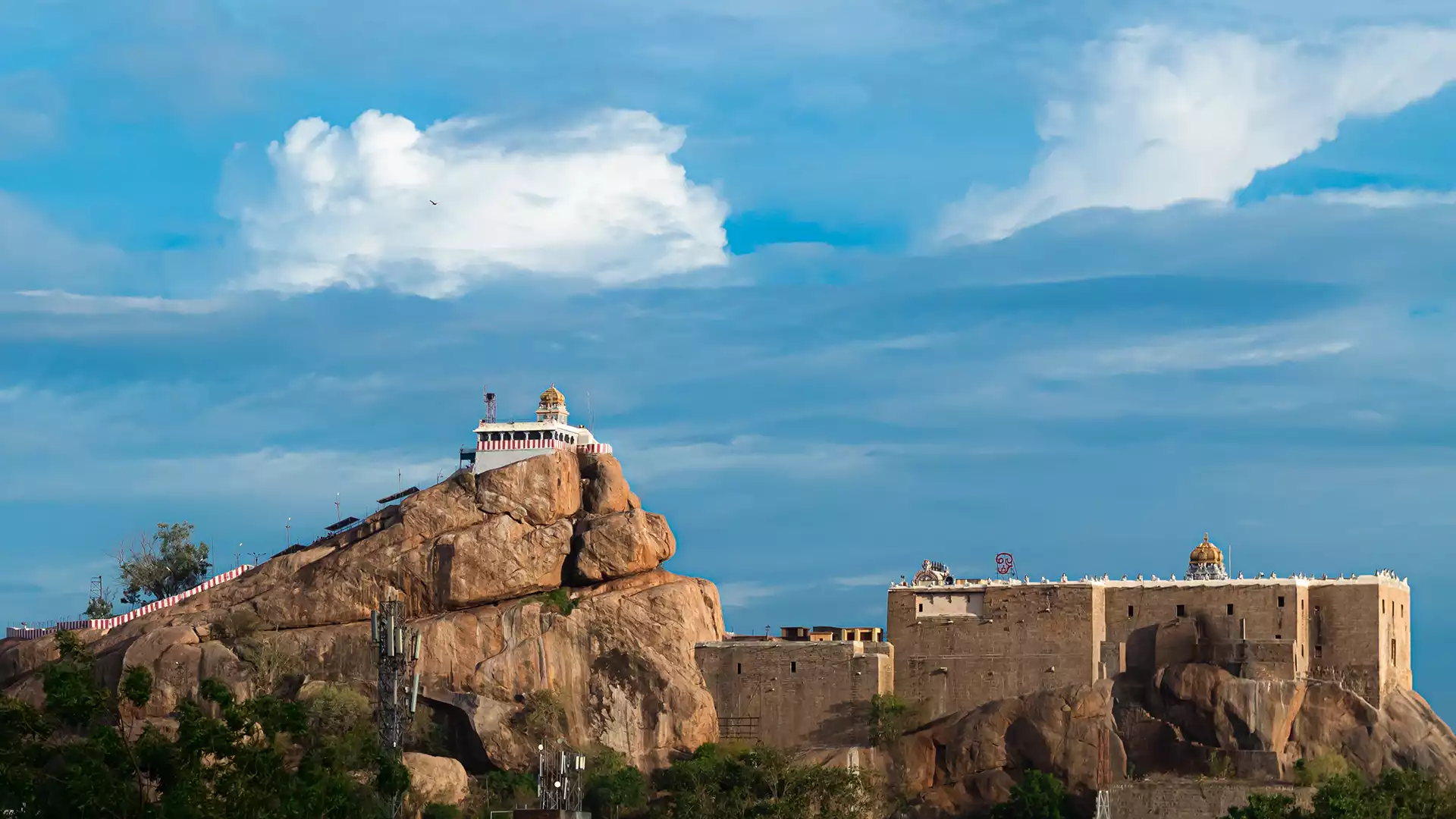 Trichy Rock Fort Temple image highlighting car loan services in Trichy district for new cars, used vehicle finance, and refinancing with low EMI options.
