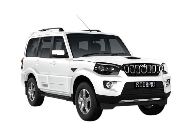 Front three-quarter view of a white Mahindra Scorpio classic SUV with a signature grille, roof rails, hood scoop, and dual front fog lamps.